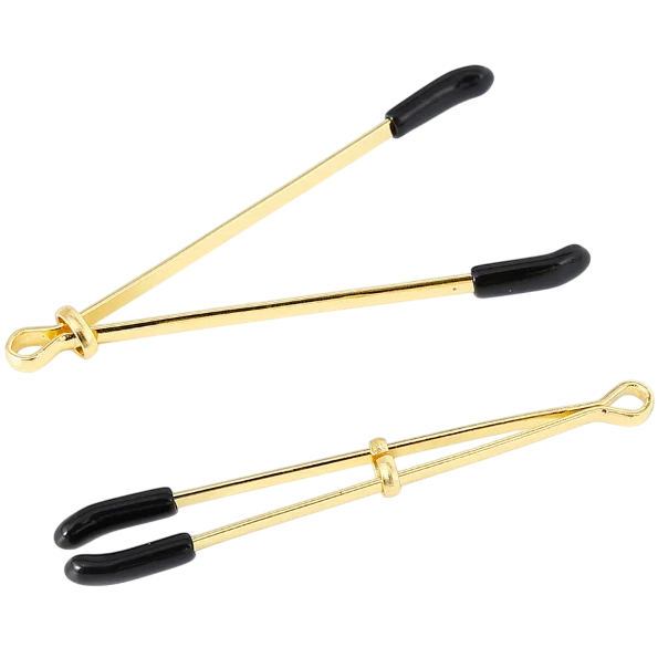 Золотистые зажимы для сосков